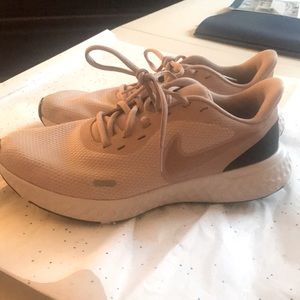 Rose gold size 9.5 women’s Nike running shoes